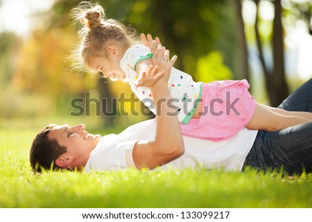 father and daughter in the park