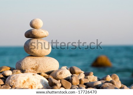 balanced stones on the sea