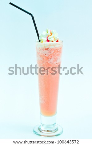 Milk shakes with fruits isolated on white and blue.