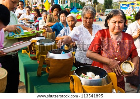 YASOTHON,THAILAND-F EB 17: unidentified people shared food offerings in 