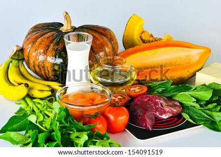 Group of foods with Vitamin A isolated on white