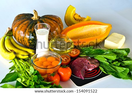 Group of foods with Vitamin A isolated on white