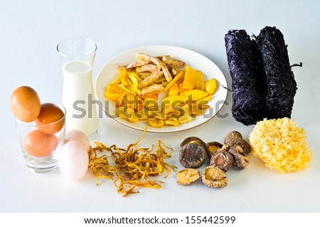 Variety of foods with potassium (minerals) isolated on white