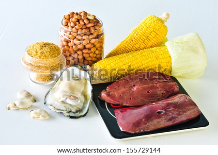 Variety of foods with Zinc (minerals) isolated on white