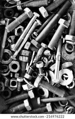 Old nut and bolts for background, Black and white photo.