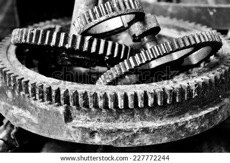 The sprocket gear to old rusty, Black and white photo.