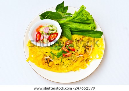 Vietnamese crepe, vietnamese crispy pancake, vietnamese cuisine isolate on white