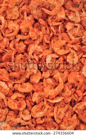 Dried shrimps on asian fish market for background