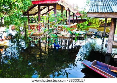 BANGKOK, THAILAND - NOVEMBER 1: flooded houses and temples of the city during the worst monsoon floods, November 1, 2011 in Bangkok, Thailand.