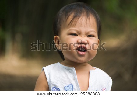 1-year-old daughter, her bright smile and cheerful.
