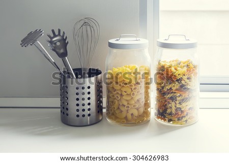glass jars on natural stone countertop