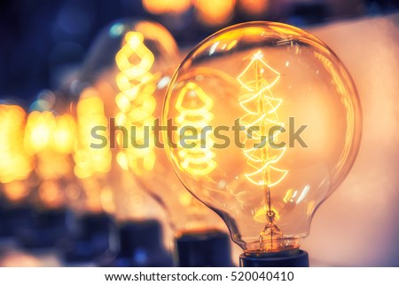 Beautiful retro luxury light bulb decor glowing for abstract background. Holiday or party background.