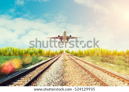 Airplane and railway at sunset. Travel or  Transporttation background concept.