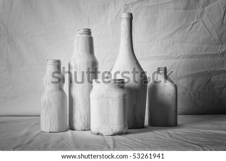 white bottles on white background