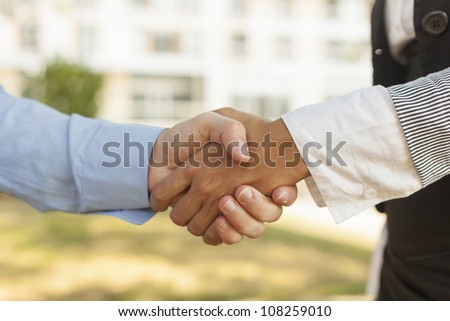 Businesspeople handshake - Woman and men shakinghand