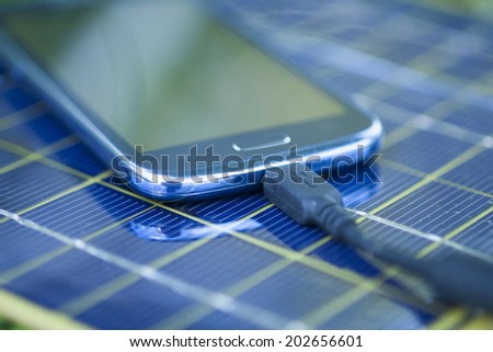 Solar Mobile Phone Chargers on grass in nature