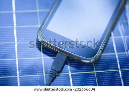 Solar Mobile Phone Chargers on grass in nature