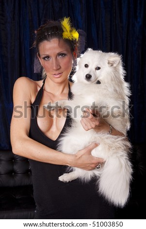 Widowed woman in black and white dog