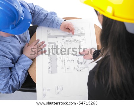 Two architects with helmet on meeting