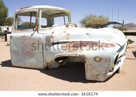 stock photo rusty car on desert