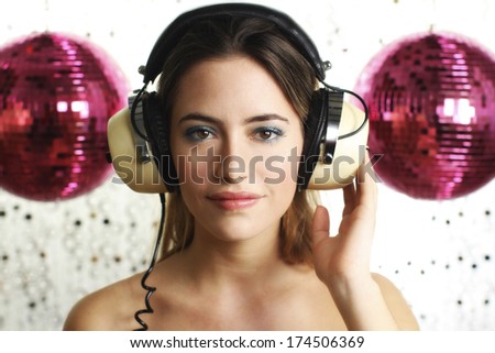 beautiful dancing woman with headphones