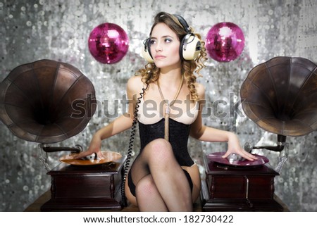beautiful sexy disco dj in lingerie with gramophones. Perfect for stylish club, disco and fashion events