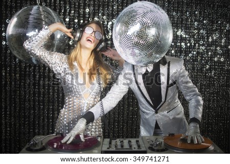 introducing mr and mrs discoball. two cool club characters DJ in a nightclub setting