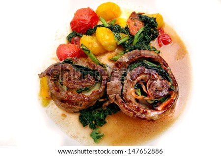 meat and vegetable dinner on white background
