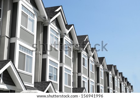 modern house of condominium rental and ownership property. building exterior and blue sky