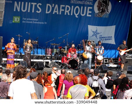 Montreal, Quebec, Canada -  free concert Summer event outdoor nuits d\'afrique african nights stage and audience .