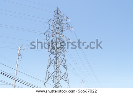 hydro electrical high voltage tower outdoors nobody wire power lines cable blue sky background horizontal format