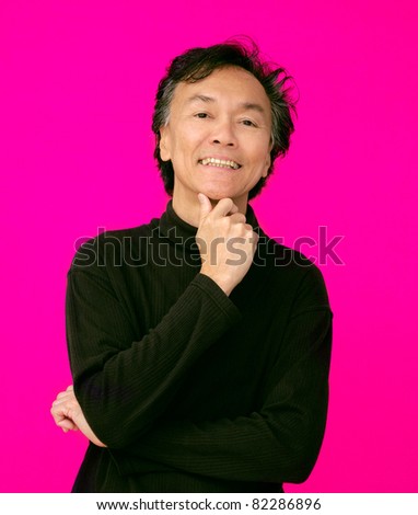 stock photo cool cool asian oriental man smiling on sexy seduction pink 