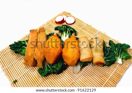 traditional oriental  dim sum ready to serve foods on decorative cuisine table-mat