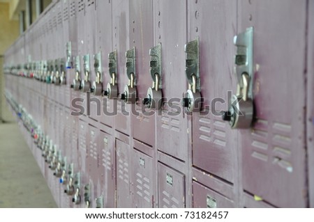 Bank of school lockers with combination locks.