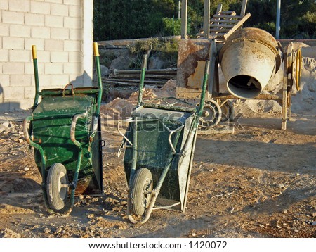 Construction Area with concrete mixer machines and carts