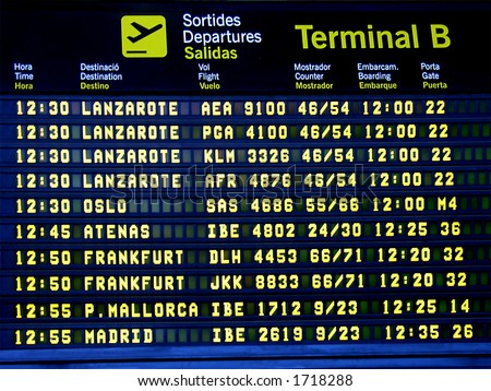 Display panel showing flight arrival time in an airport