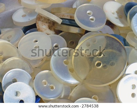Collection of buttons used by tailors to sew up