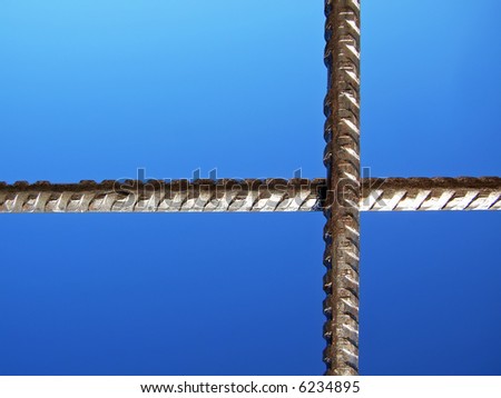 Flag style composition with iron bars crossed and the sky