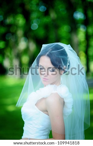 close-up portrait of a pretty shy bride