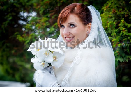 close-up portrait of a pretty shy bride