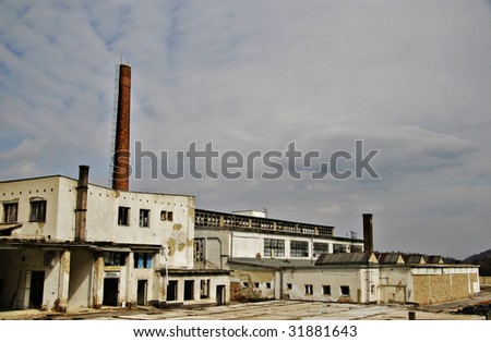 abandoned bankrupted factory with text space