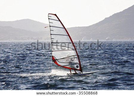 wind surfer enjoying freedom and speed
