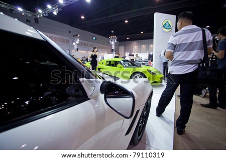 BANGKOK - MAY 20 : LOTUS ELISE SC with a model on display during the \