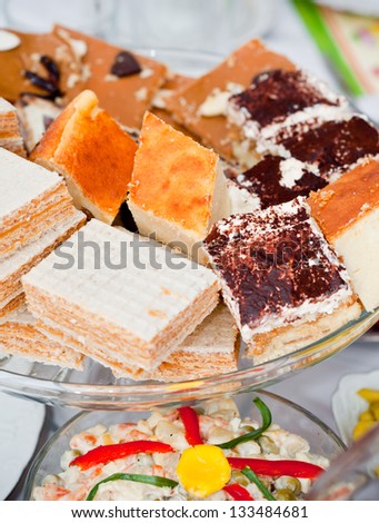plate with the home-baked cakes and pastries