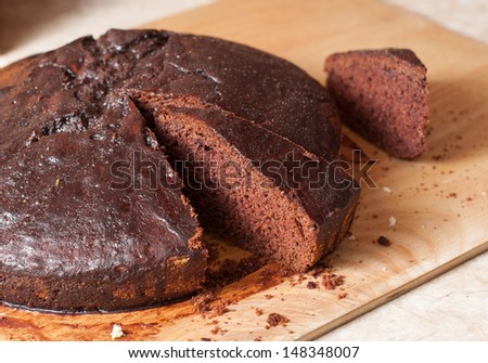 Polish honey cake of the cocoa about the name of deeply tanned man in the kitchen
