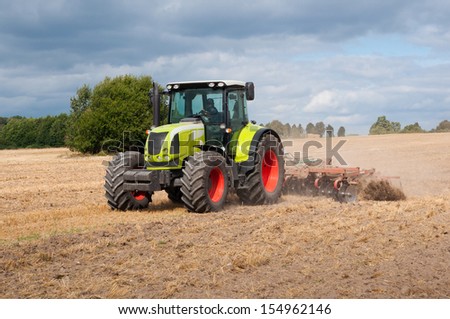 tractor on field on job