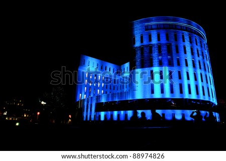 EINDHOVEN/NETHERLANDS - 10 NOVEMBER-2011: Office building with blue lighting during lightshow \
