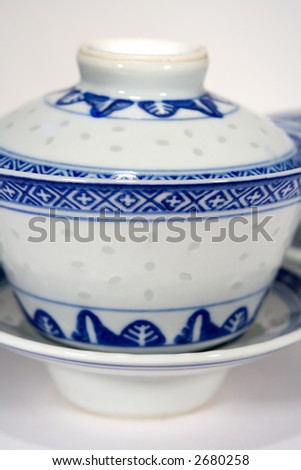 Blue and white china tea cups shot close up.
