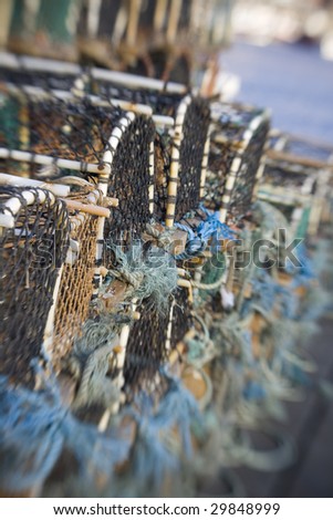 Lobster Pots shot with lensbaby, sweetspot focus on fishing industry items.