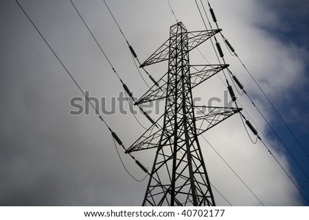 Electricity Pylon clouds and sky, power distribution.